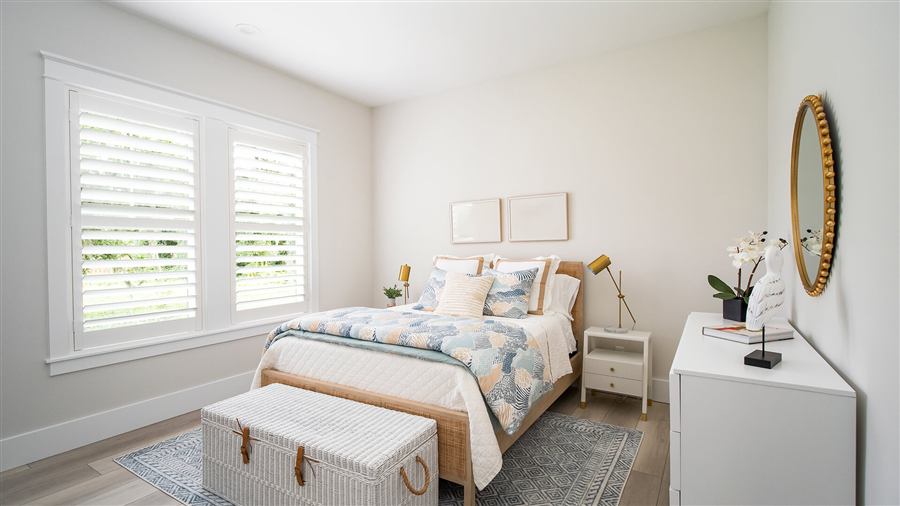 Staged bedroom in a furnished short-term rental investment property